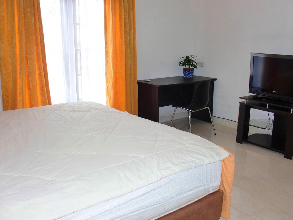 Libra Homestay Manado Phòng bức ảnh