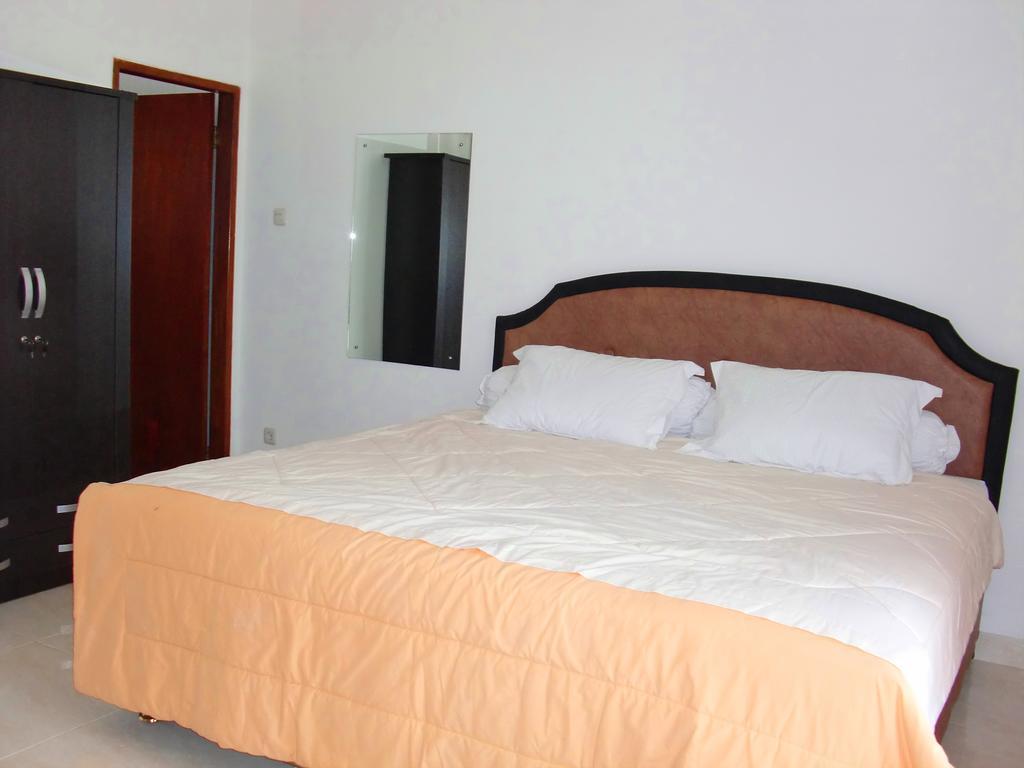 Libra Homestay Manado Phòng bức ảnh