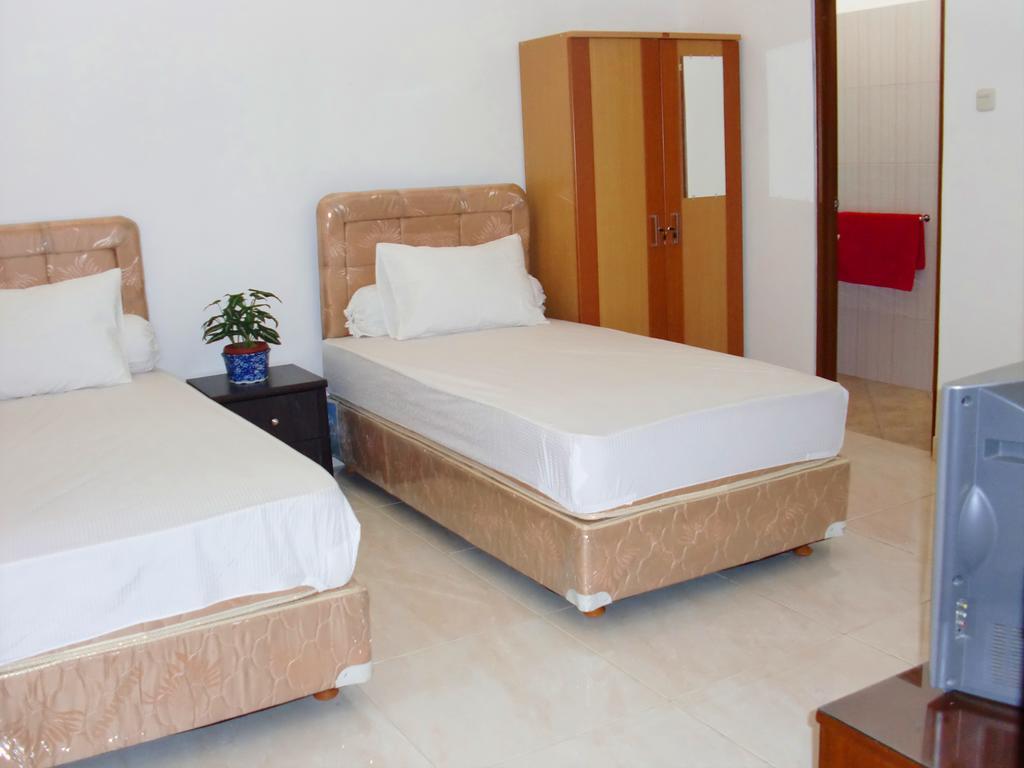 Libra Homestay Manado Phòng bức ảnh